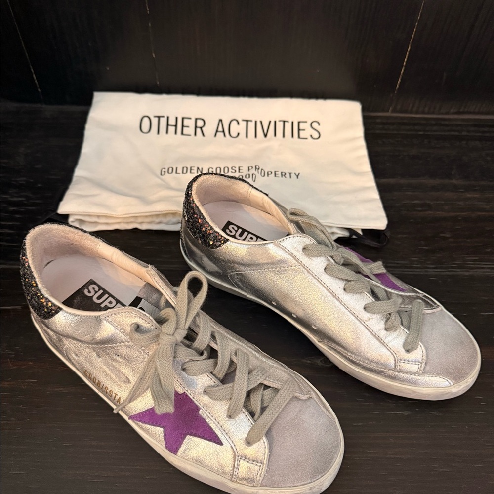 Golden Goose Metallic Silver Sneakers with Purple Star and glitter back.